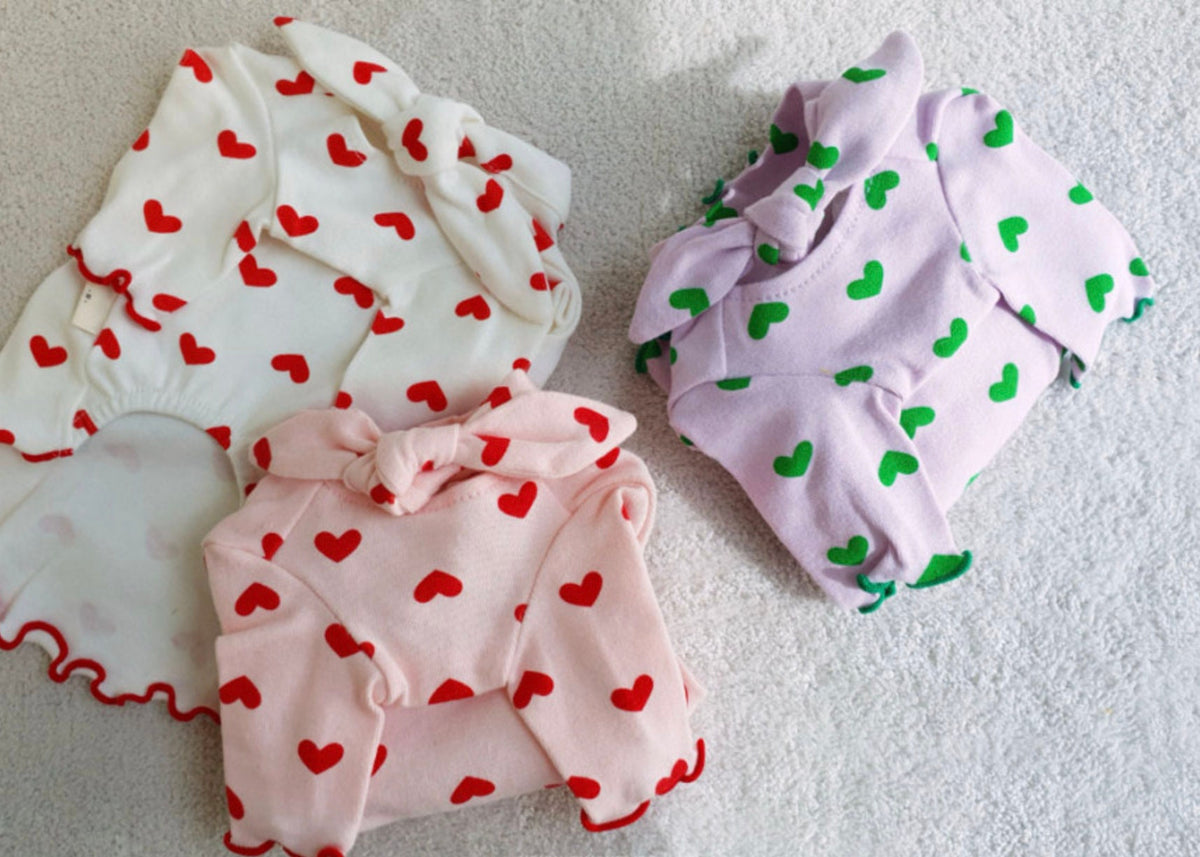 NKpup Heart Tie Dog Shirts in white, pink, and lavender with red and green heart patterns