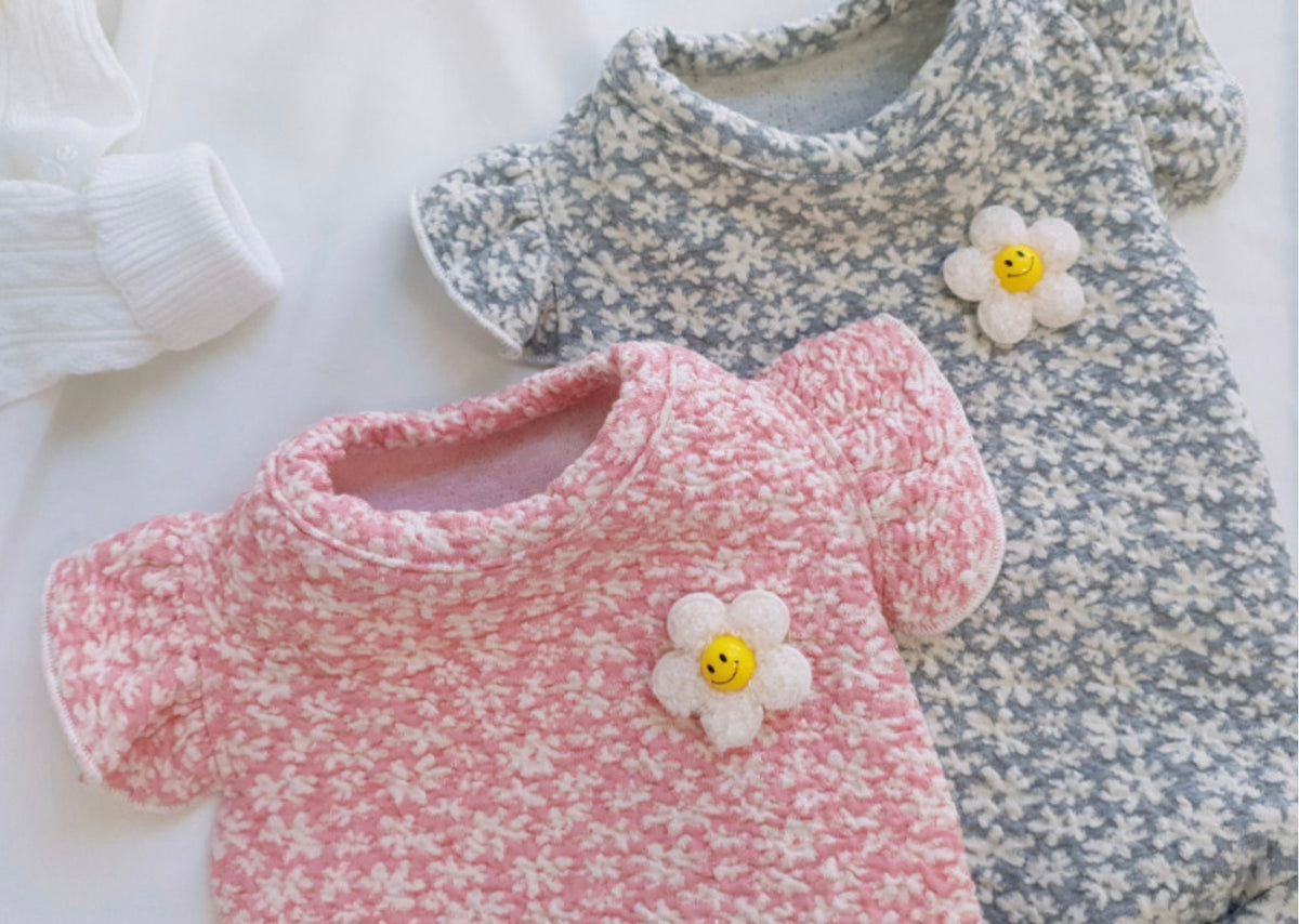 NKpup Floral Quilted Sleeveless dog vests in pink and grey with daisy flower accents.