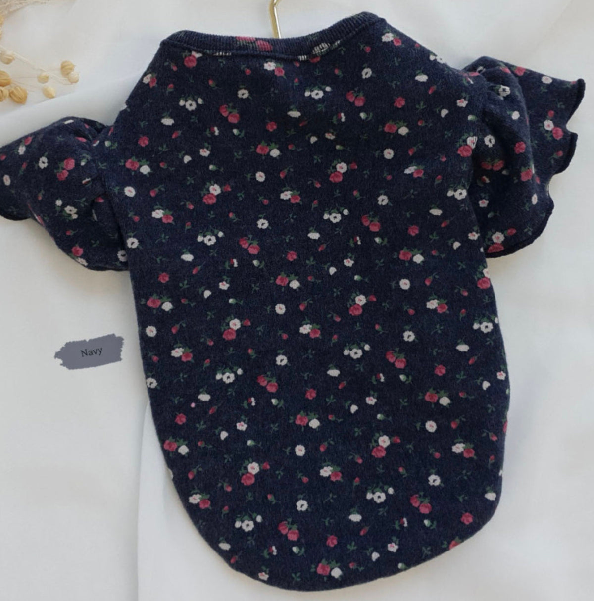 NKpup navy blue frilled floral dog shirt with small white and pink flowers