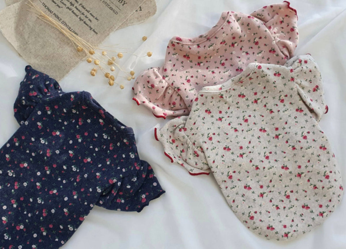NKpup frilled floral dog shirts in navy, pink, and cream colors