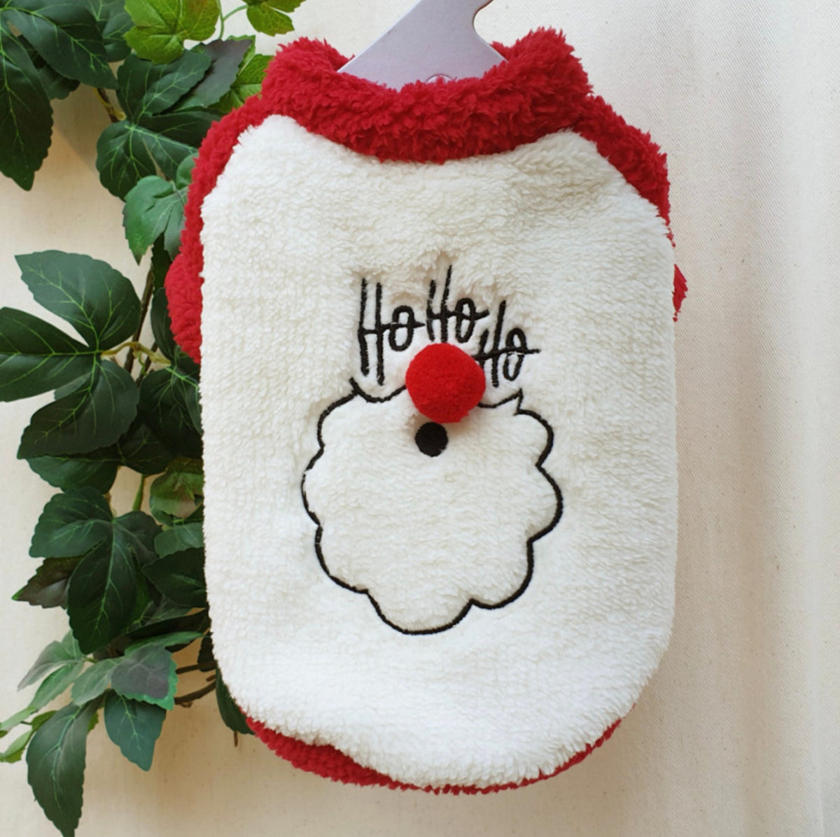NKpup Santa Face fleece dog shirt with red trim and Ho Ho Ho embroidery.