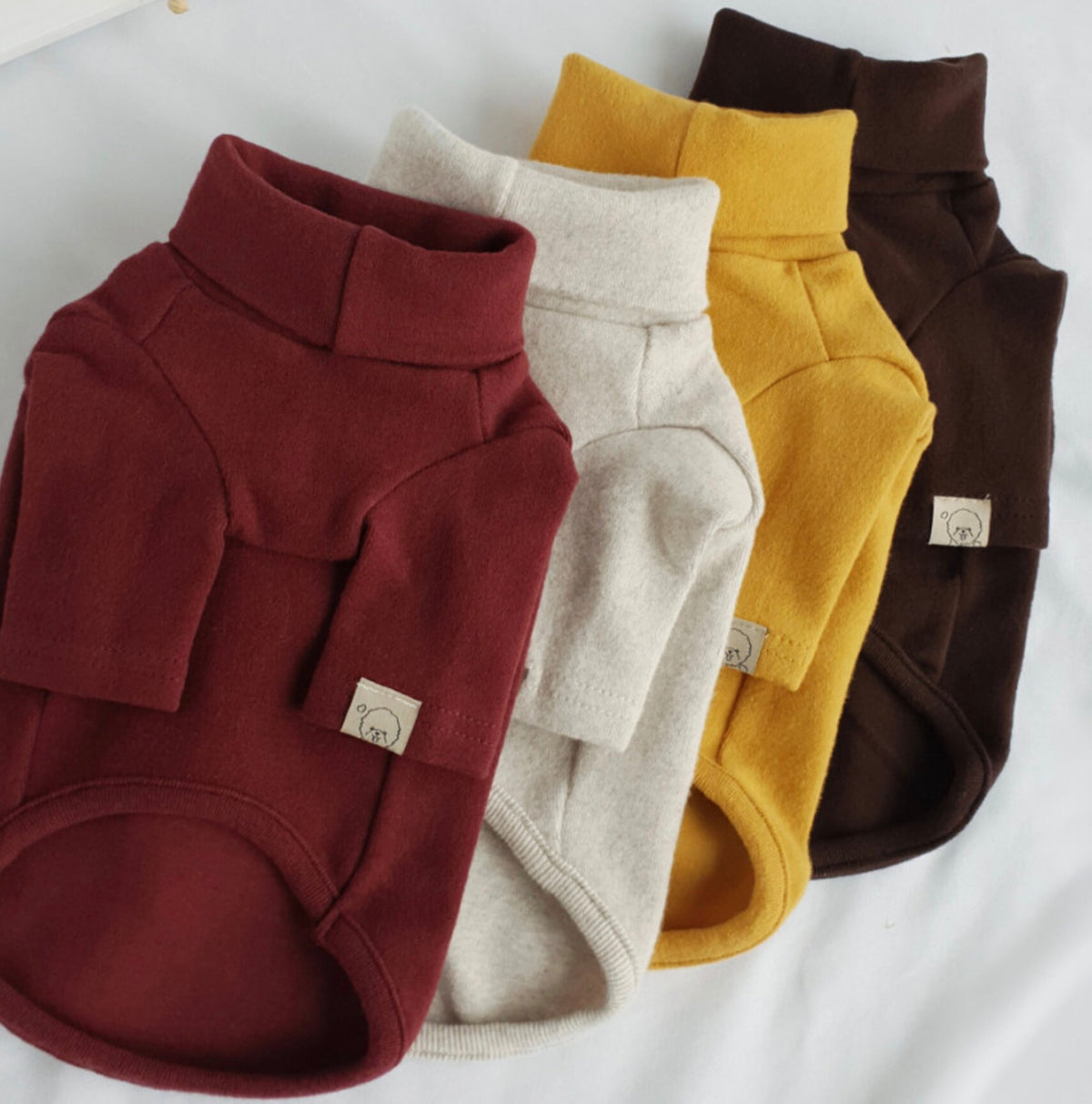 NKpup Basic Dog Turtleneck Shirts in burgundy, cream, mustard yellow, and brown.