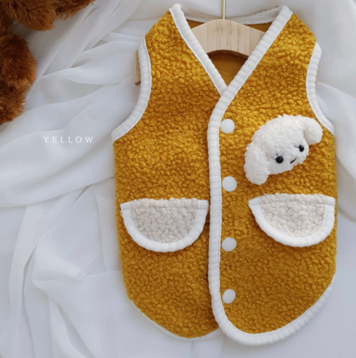 NKpup Bear Fleece Dog Vest in yellow with white trim and a cute plush bear face detail