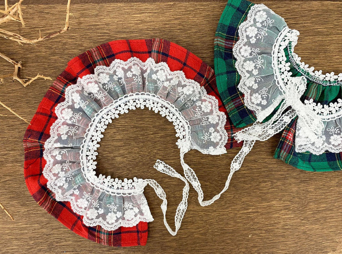 Red and green Christmas plaid dog capes with white lace trim by NKpup