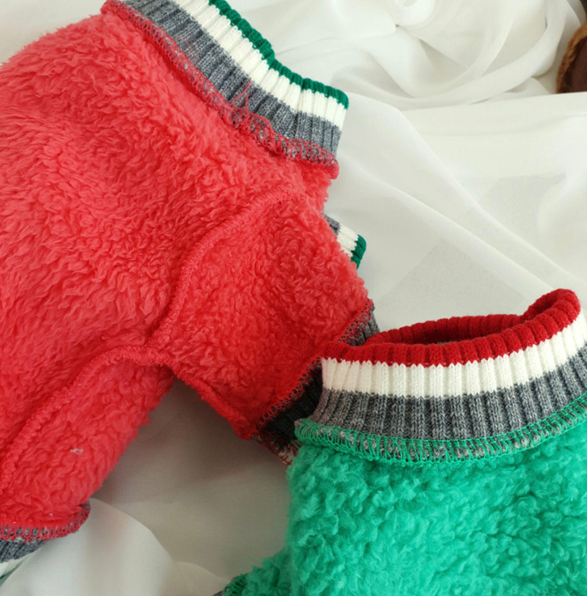 Rudolph fleece dog sweatshirt in red and green with striped ribbed collars