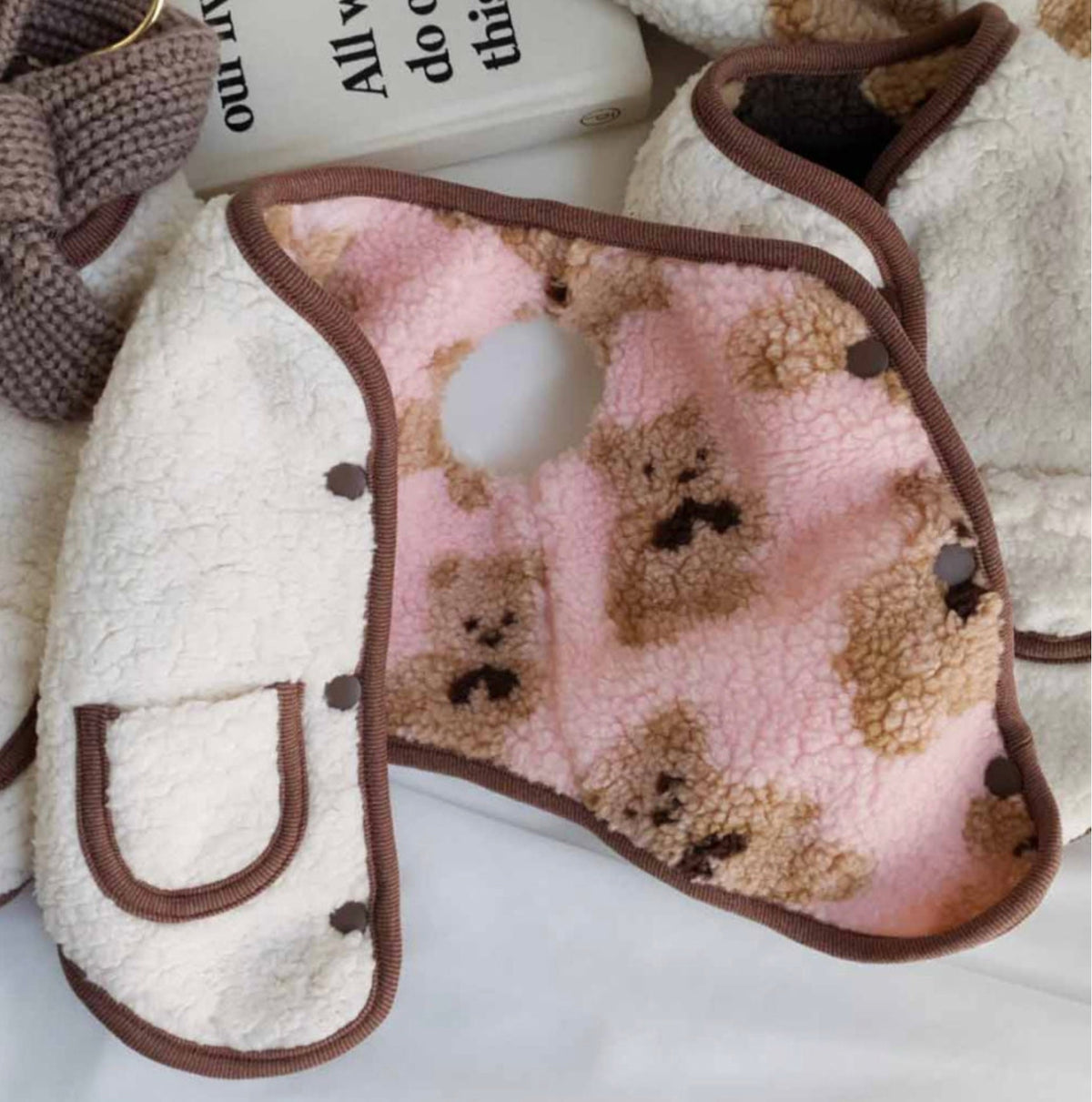 Reversible bear pattern fleece dog vest in cream and pink