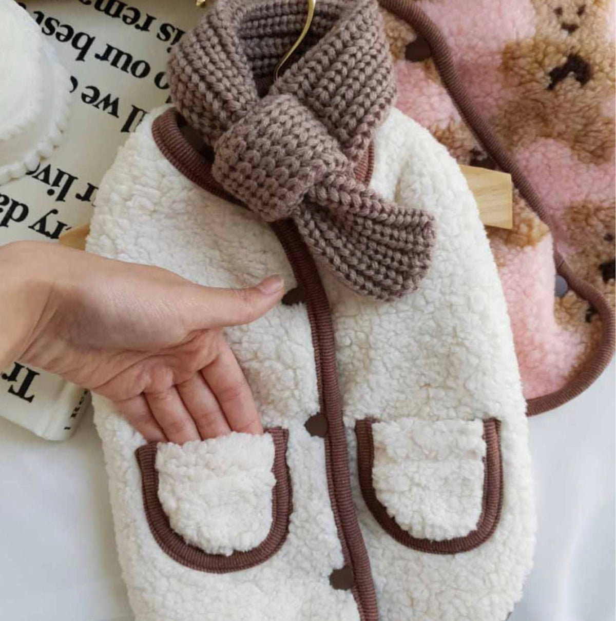 NKpup Reversible Bear Fleece Dog Vest in cream and pink with a brown knit scarf detail