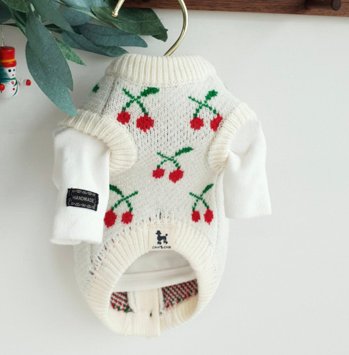 Christmas cherry knit dog cardigan in white with red cherry patterns