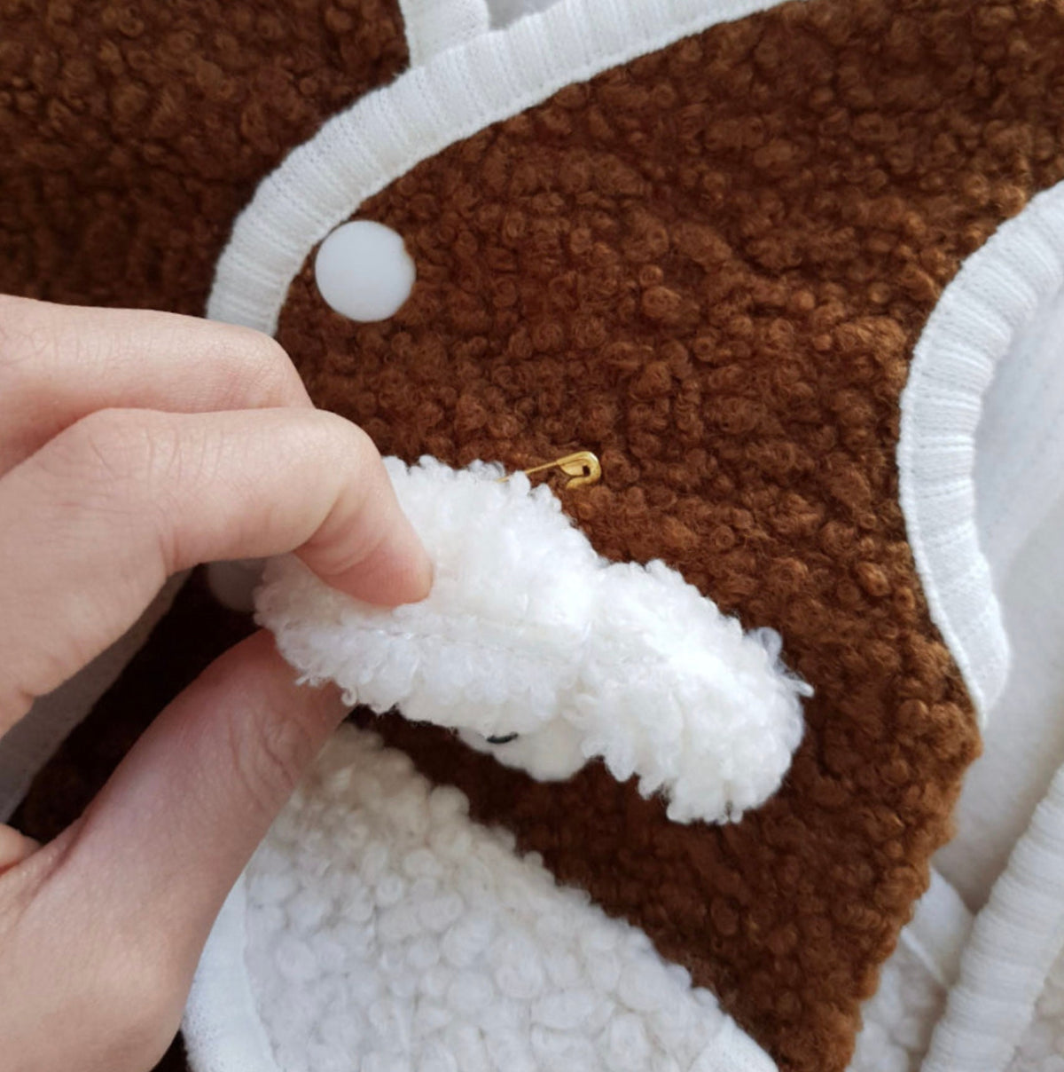 Brown Bear Fleece Dog Vest with white trim and decorative bear ear detail by NKpup