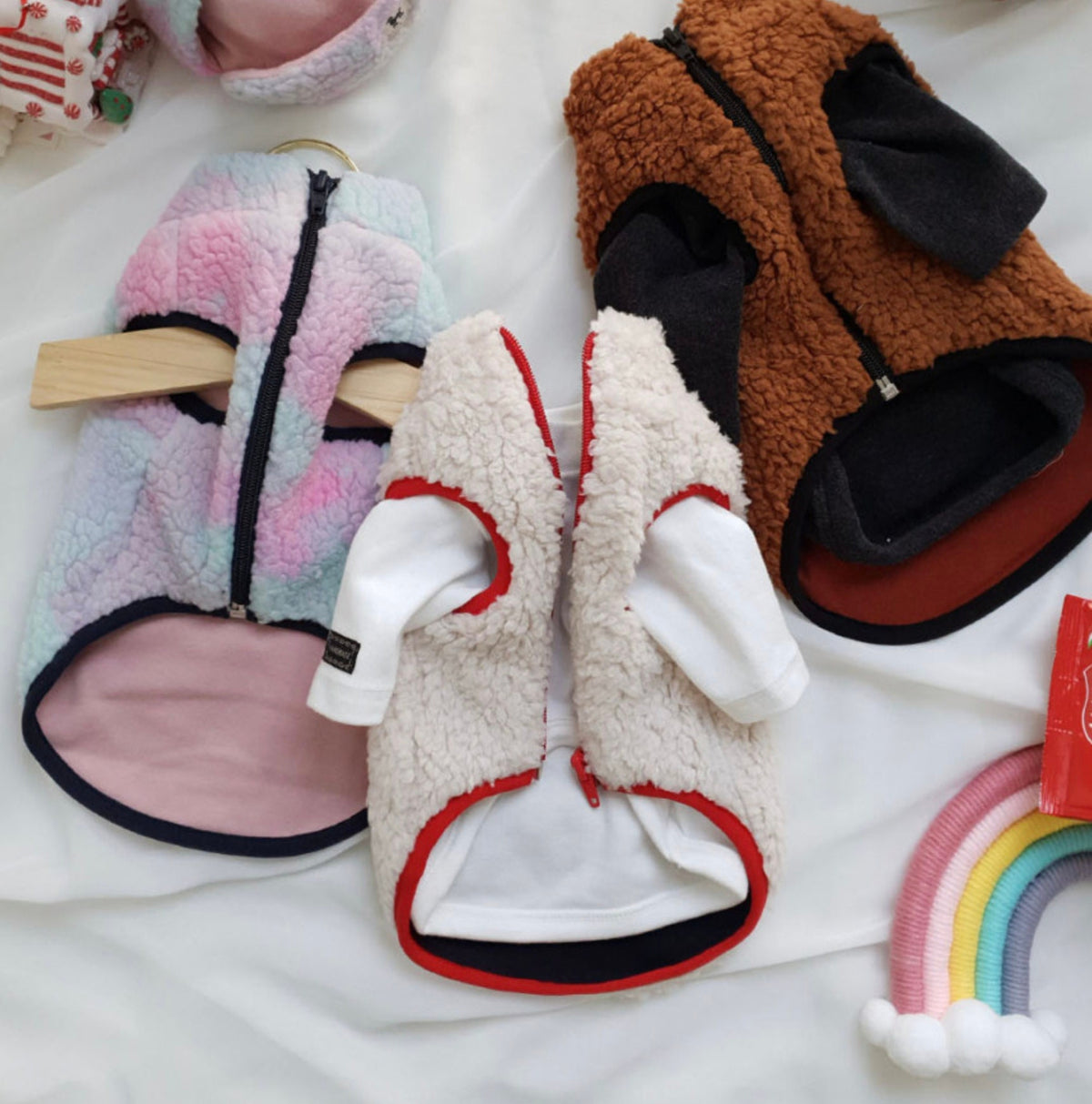 NKpup Bear Fleece Dog Vests in pastel pink, cream, and brown colors