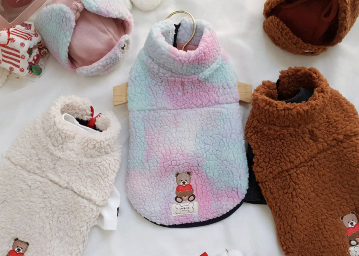 NKpup Bear Fleece Dog Vest in pastel pink, blue, and brown colors with bear embroidery.