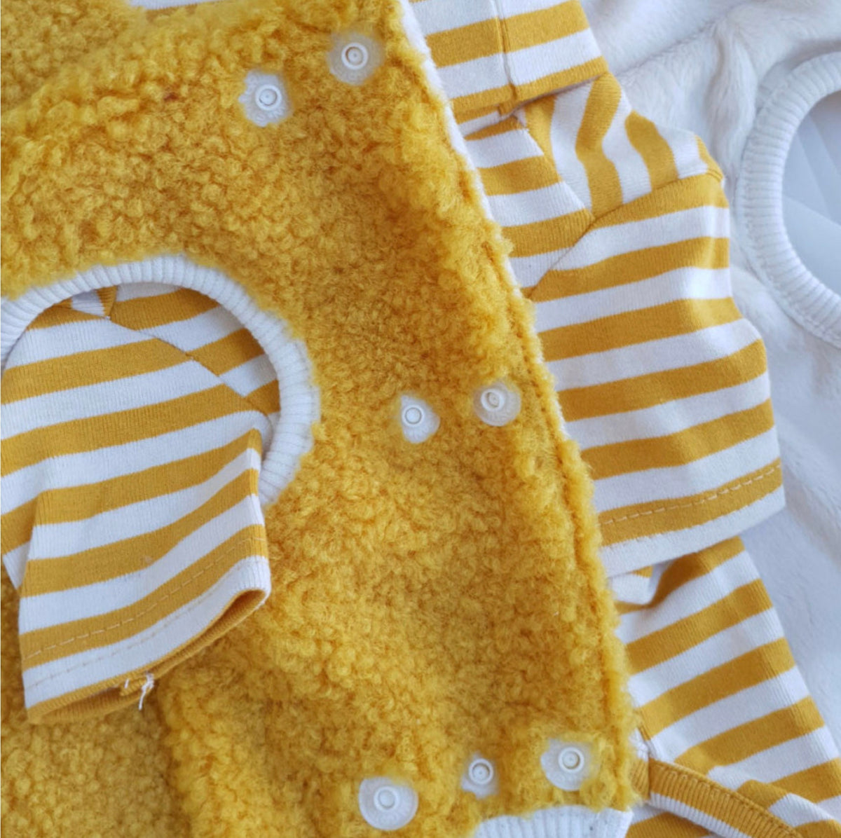 Yellow fleece baby bear dog hoodie vest with white striped sleeves