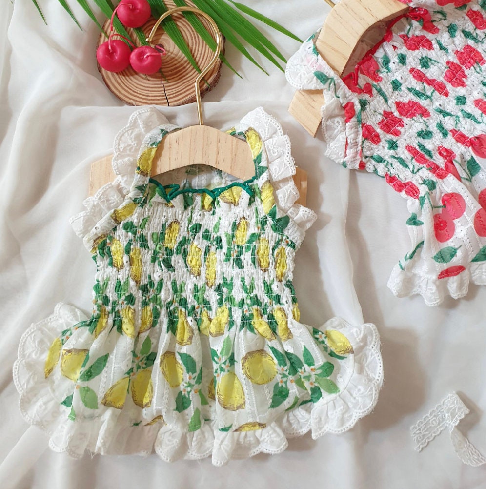 NKpup Fruits Dress with yellow lemon pattern and white lace trim