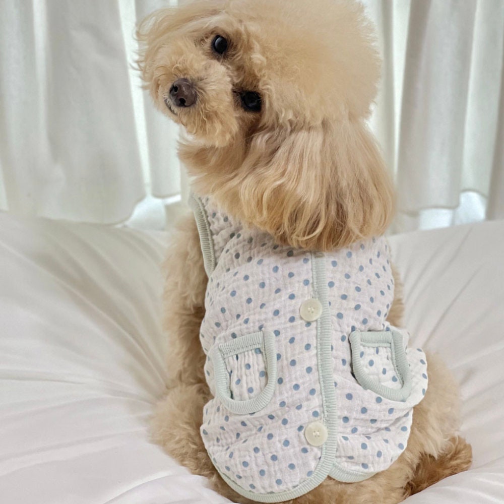White and blue polka dot crinkle dog vest with two front pockets and button details