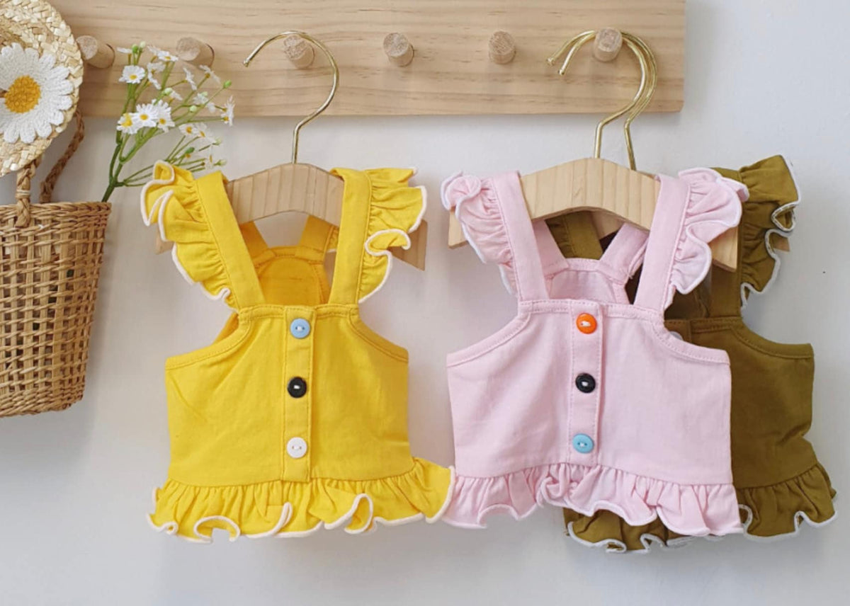 NKpup Frilled Dog Crop Tops in yellow, pink, and olive green with button details.