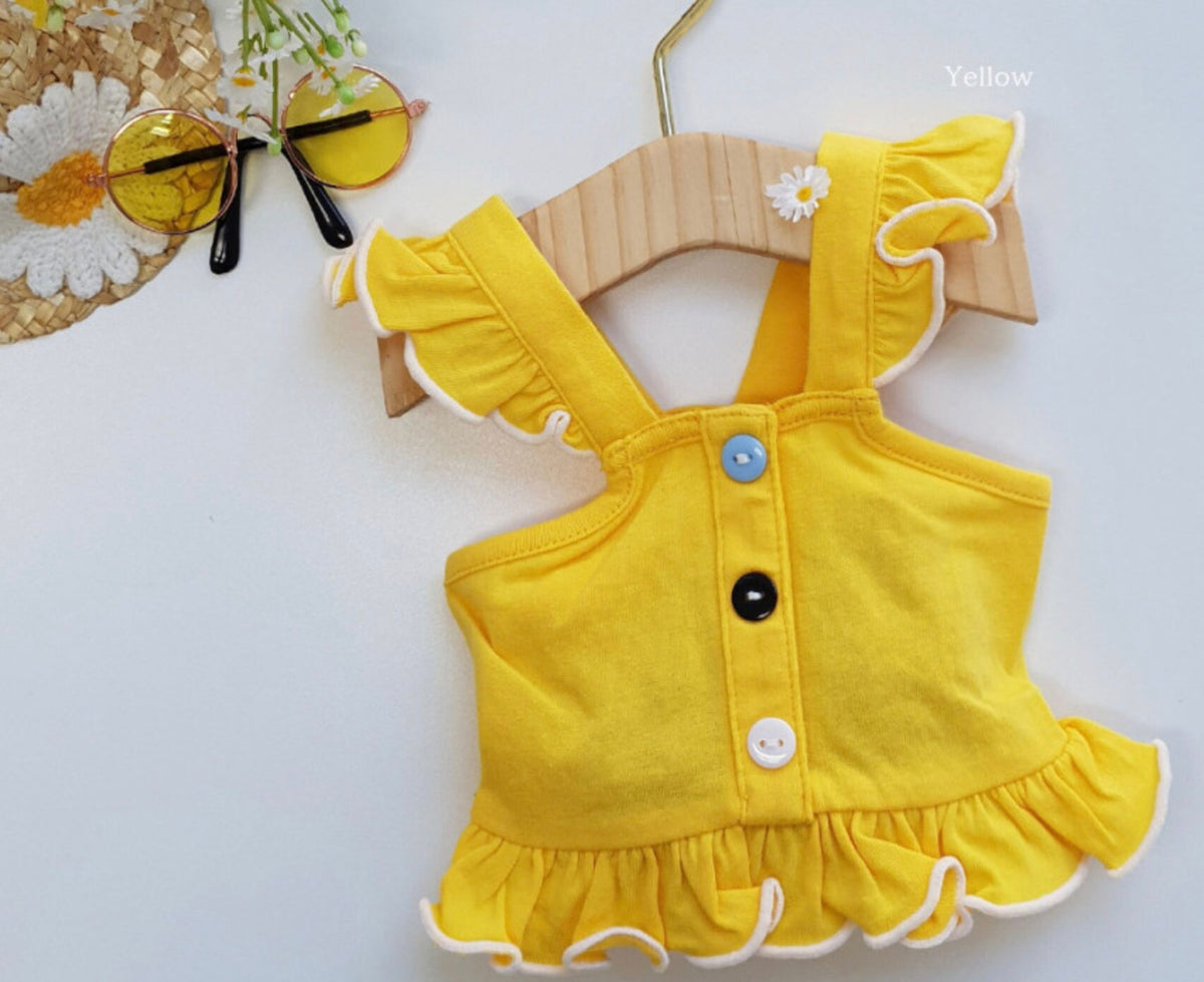 Yellow NKpup frilled dog crop top with decorative buttons and white trim