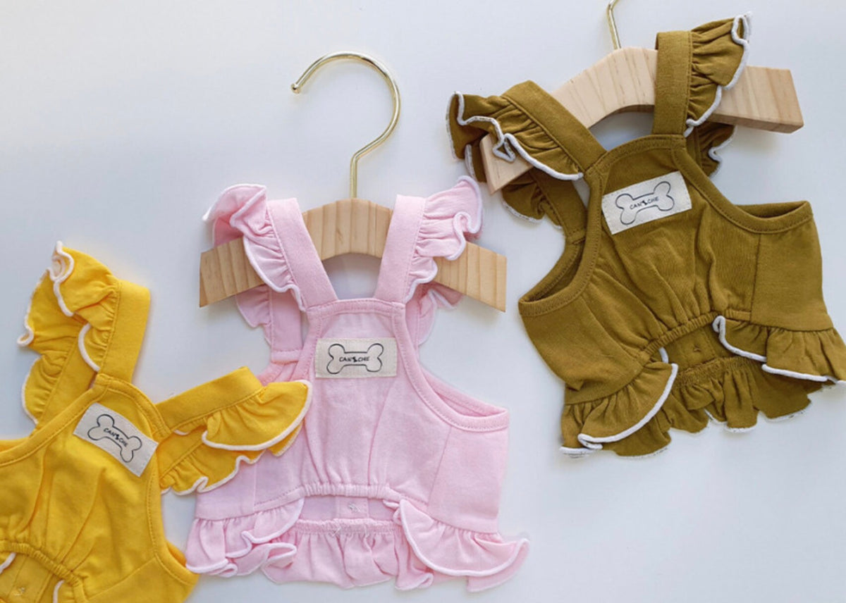 NKpup frilled dog crop tops in yellow, pink, and mustard brown with ruffle straps and hem.