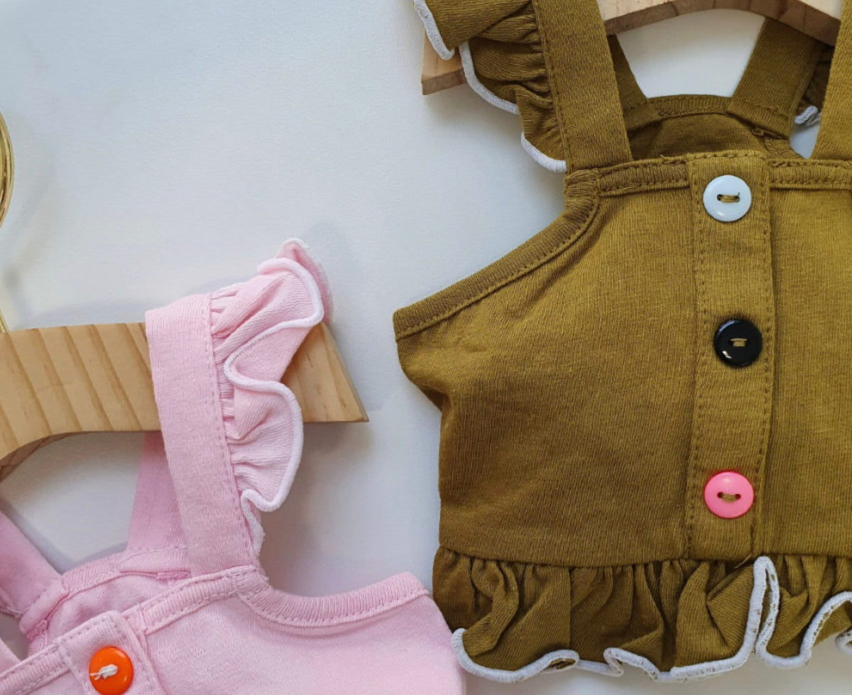 NKpup frilled dog crop tops in mustard yellow and light pink with button details