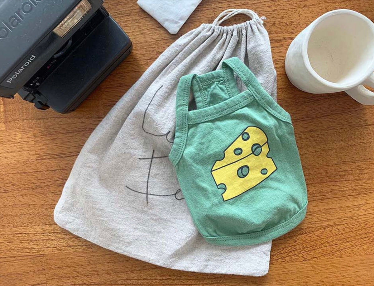 NKpup washed cotton sleeveless green dog shirt with a yellow cheese graphic