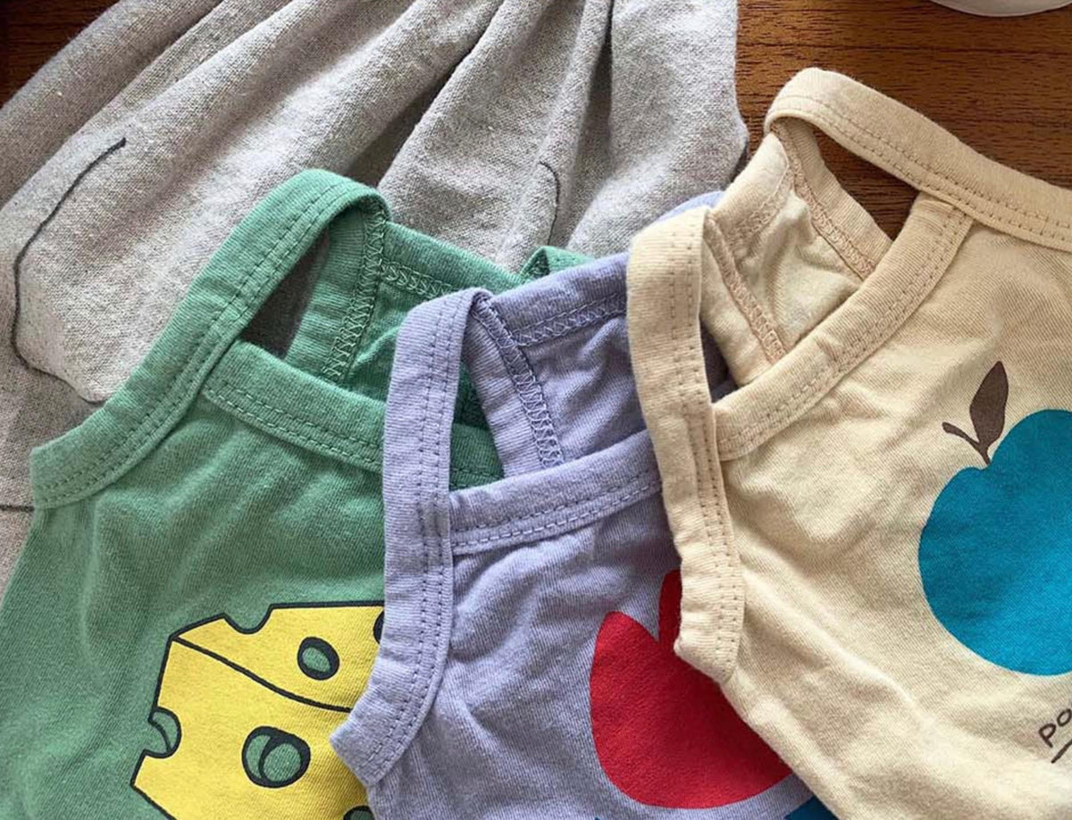 NKpup washed cotton sleeveless dog shirts in green, purple, and cream with food patterns
