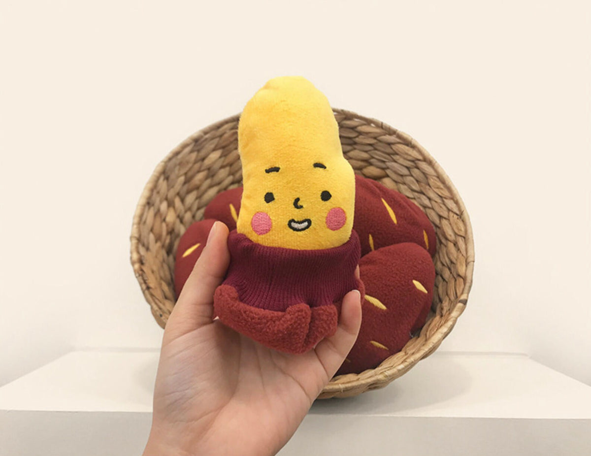 NKpup Snuffle Sweet Potato dog toy in yellow and reddish-brown