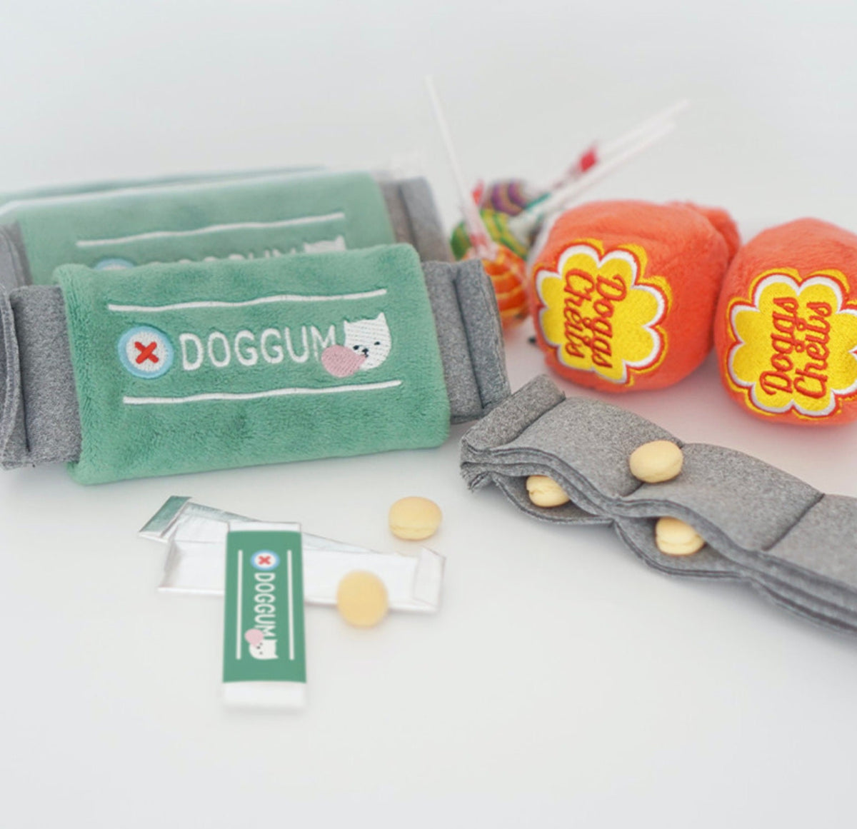 NKpup Snuffle Chewing Gum Dog Toy in green and orange with small treats.