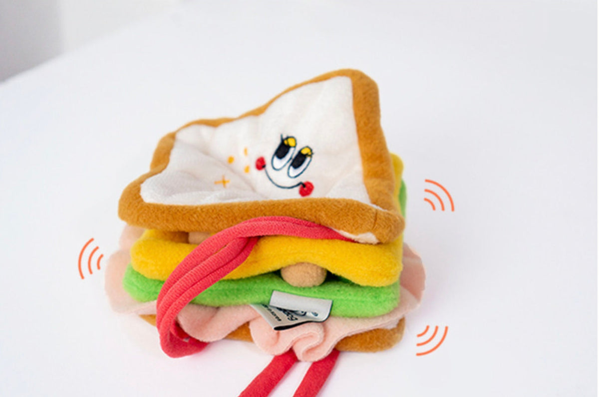 NKpup Snuffle Sandwich dog toy with a white bread slice and colorful plush layers.