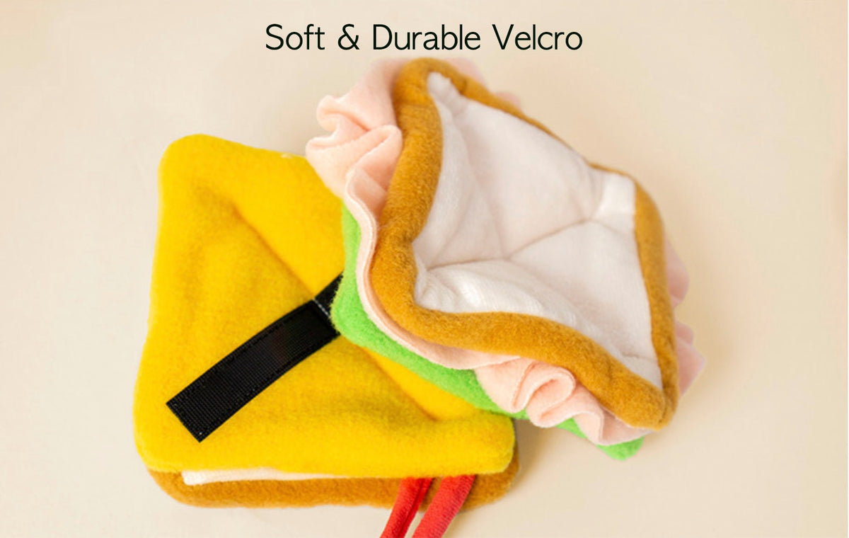 Yellow and pink Snuffle Sandwich Dog Toy with soft fabric layers and durable velcro.