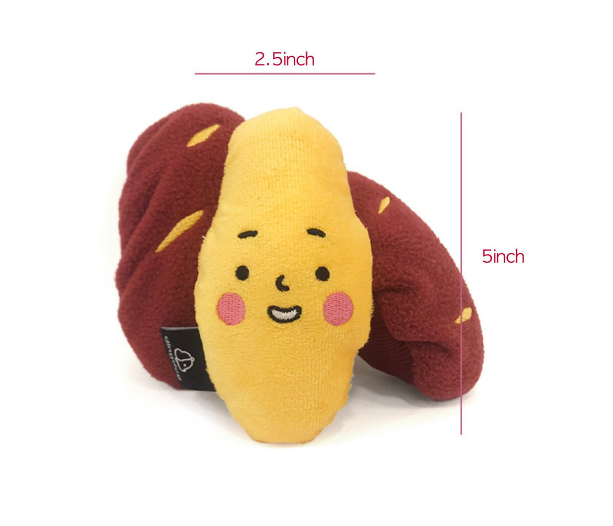Snuffle Sweet Potato dog toy with a cute smiling face in yellow and reddish-brown.