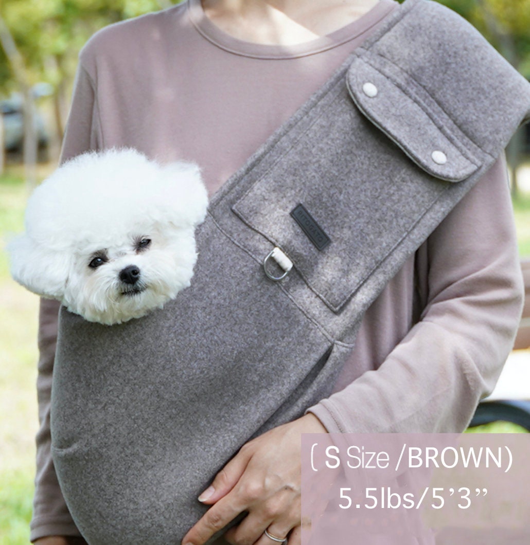 NKpup brown wool pet sling carrier with a front pocket and silver ring detail