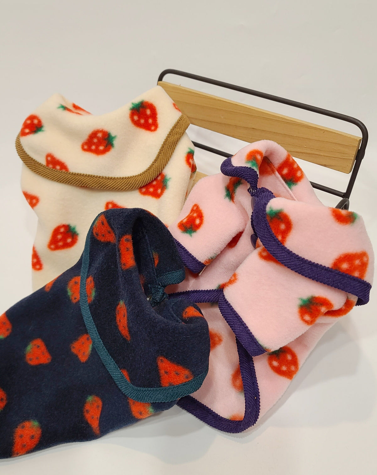 NKpup strawberry fleece dog cardigans in cream, pink, and navy blue