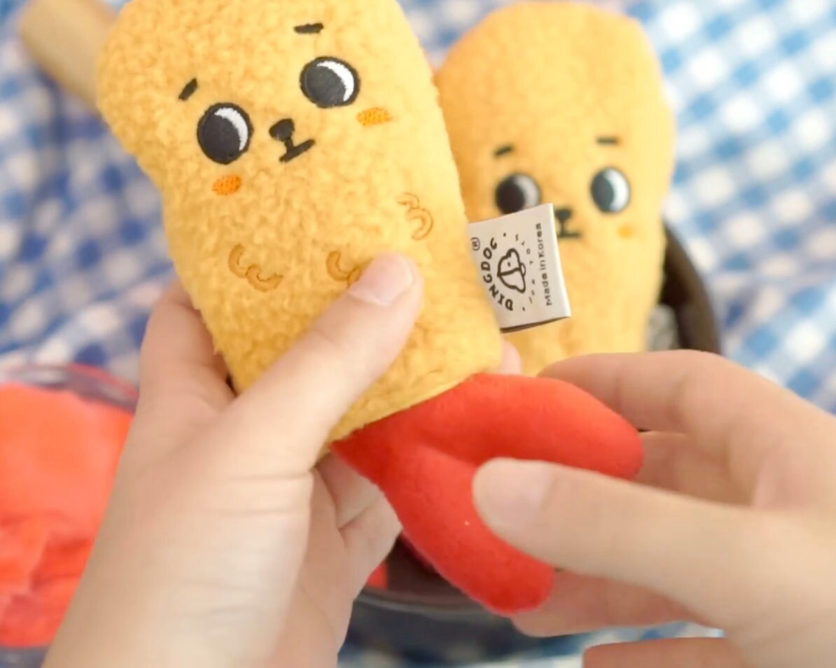 NKpup Snuffle Shrimp Tempura dog toy with a plush textured design and cute character face.