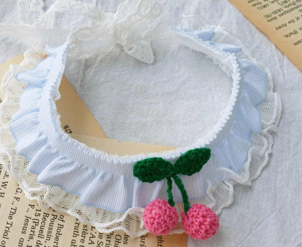NKpup Cherry Lace Dog Cape in white with pink crochet cherry accents