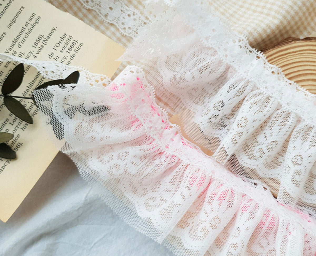White lace pompom dog cape with pink ruffled trim by NKpup