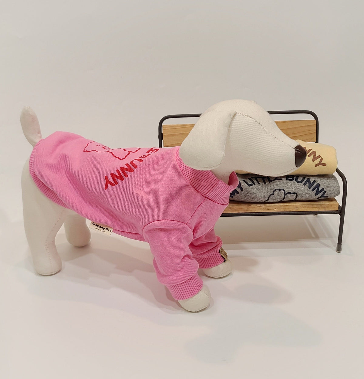 Pink Wild Bunny sweatshirt for dogs featuring bunny graphic design.