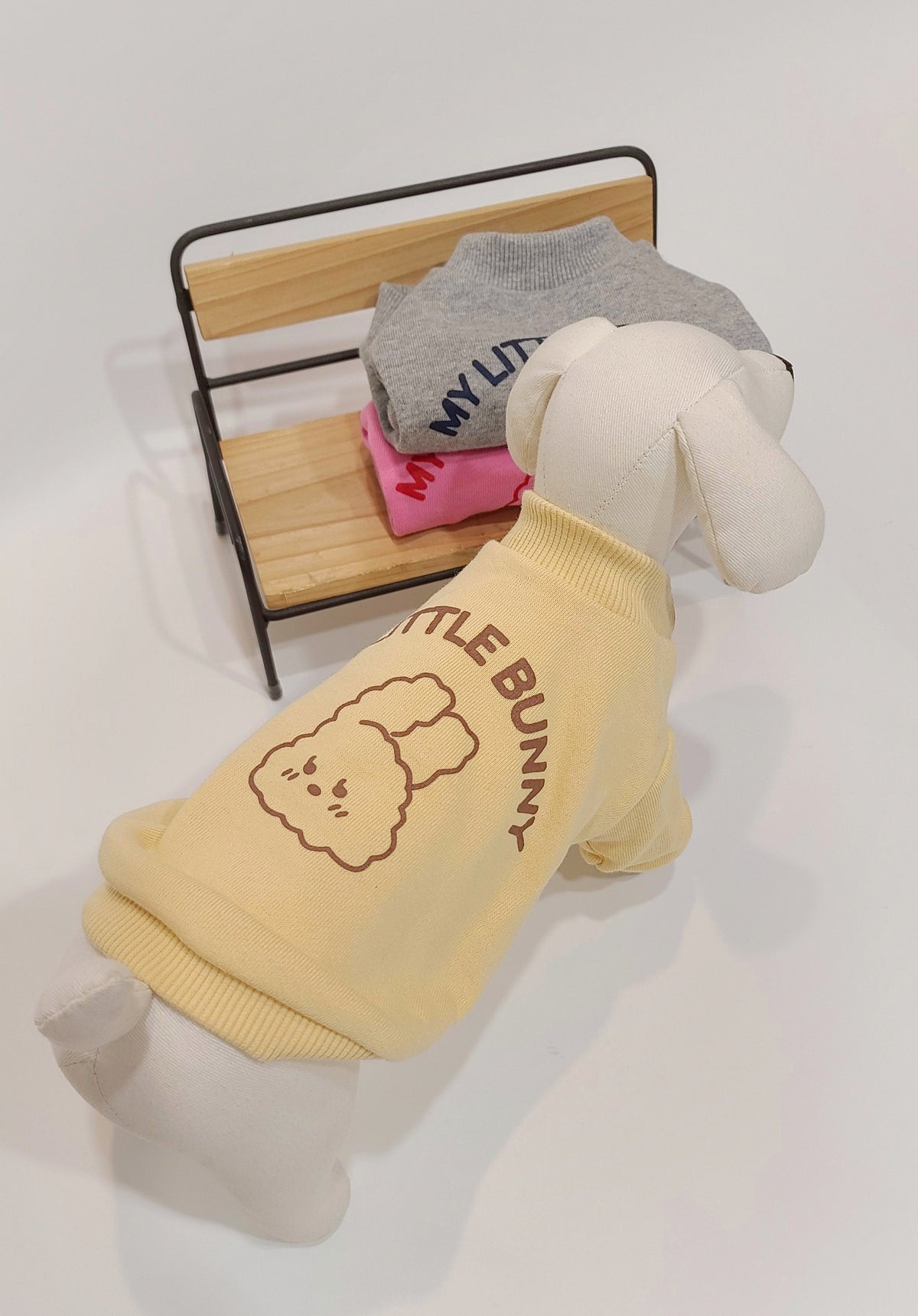 Yellow Wild Bunny sweatshirt for pets featuring a cute bunny graphic and brown lettering.