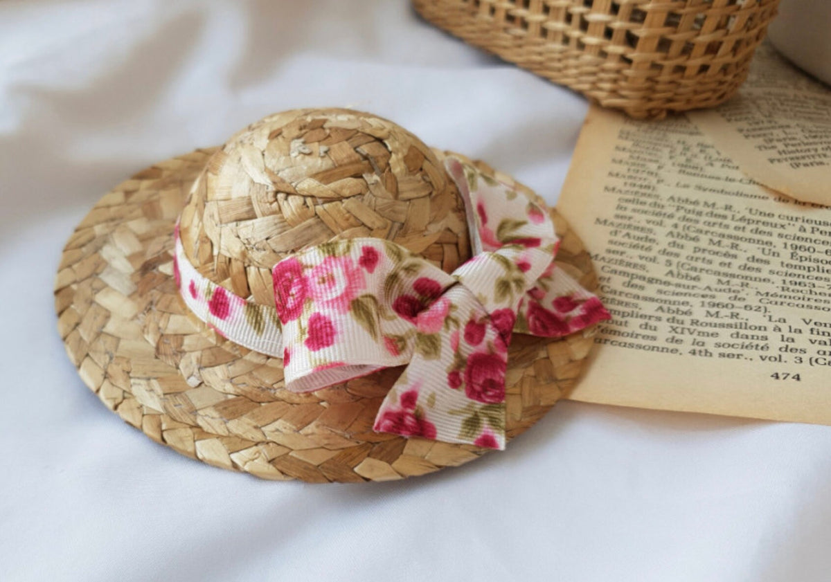 Straw ribbon dog hat with pink floral pattern bow by NKpup