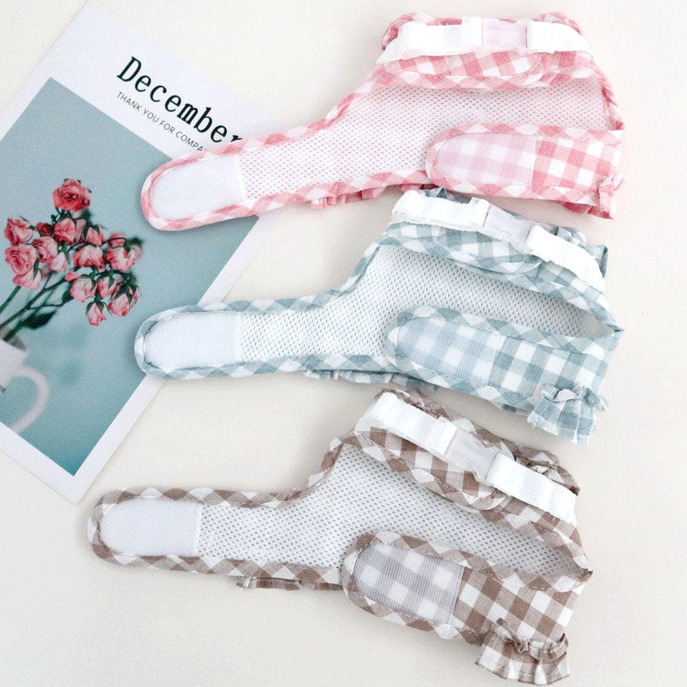 NKpup Gingham Frilled Harness in pink, light blue, and brown checkered patterns.