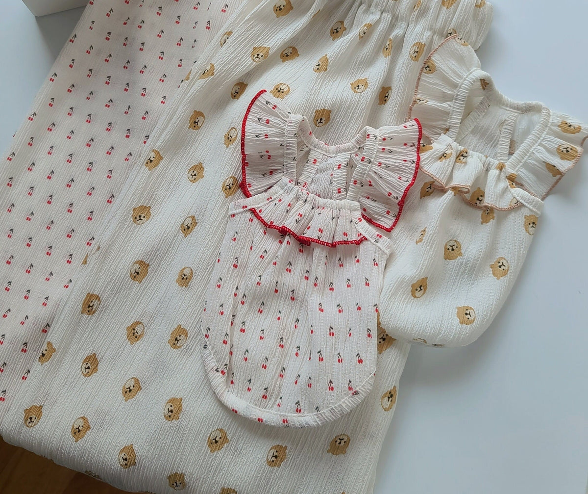 NKpup Wing Sleeveless white dog vest with red ruffled trim and cherry pattern