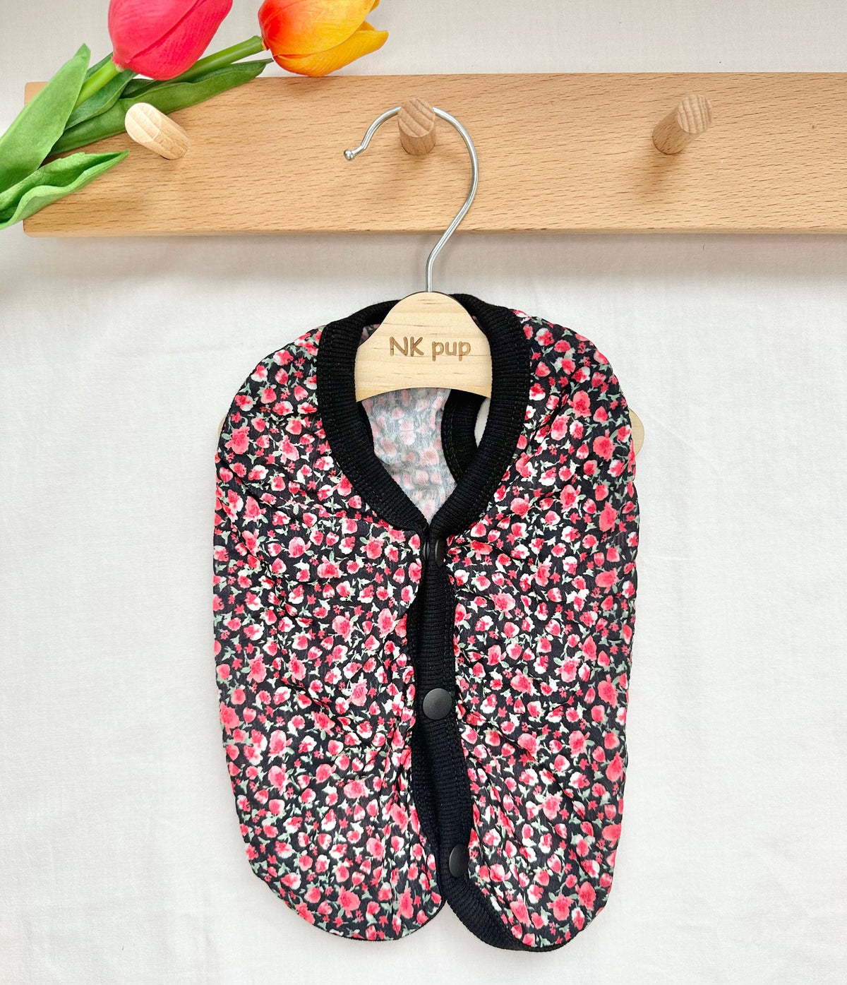 NKpup mini floral dog vest with black trim and pink flower pattern