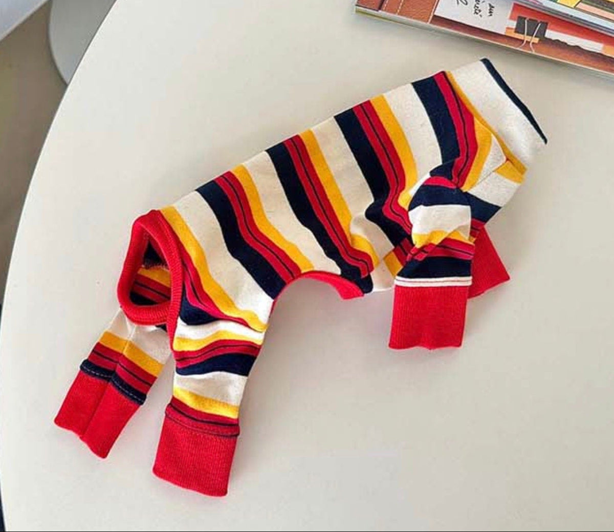 NKpup Multi Stripe Dog Overall with colorful red, yellow, and navy stripes
