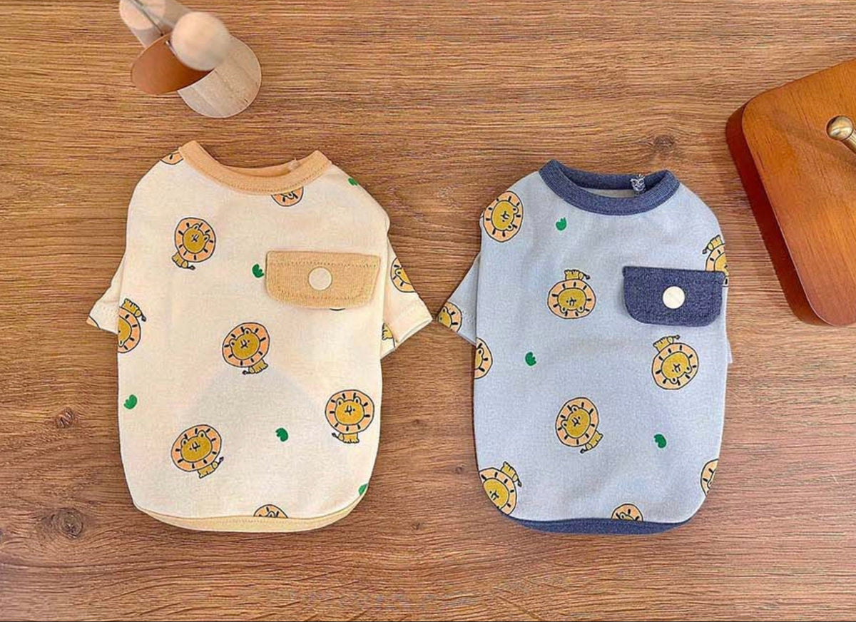 NKpup lion print dog shirts in cream and light blue with front chest pockets