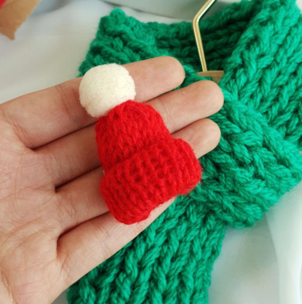 Handmade red and white knitted Santa hat accessory for a Christmas dog scarf by NKpup