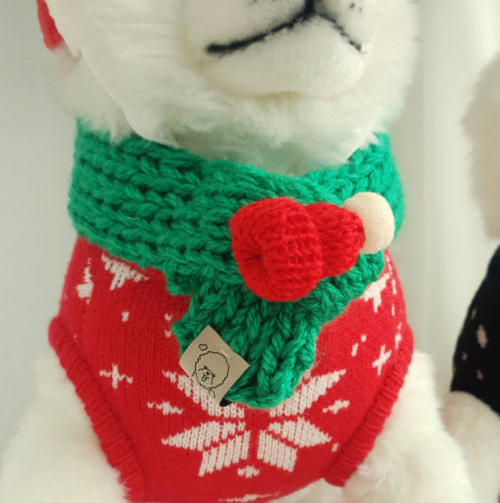 Christmas handmade knit green dog scarf with red bell accent and red snowflake pattern sweater