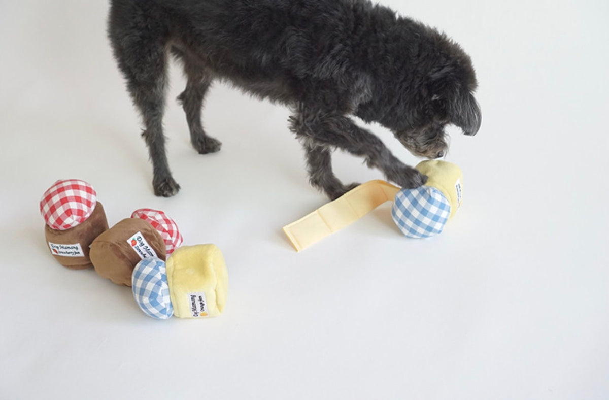 NKpup Snuffle Jam dog toys in blue gingham, red plaid, and yellow fabric patterns.