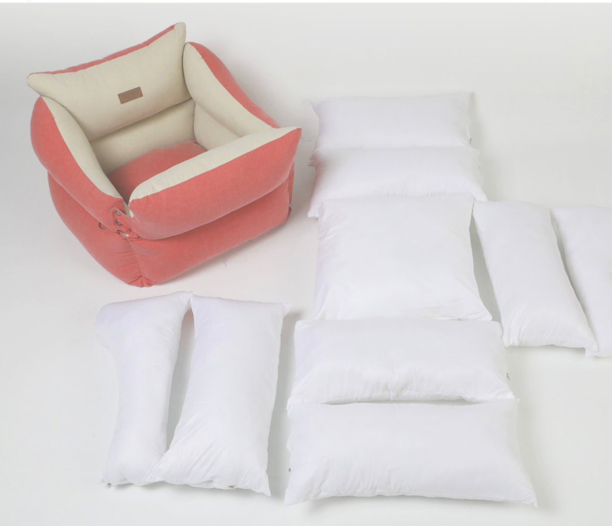 Pink and cream smart cotton pet car seat with multiple white support pillows