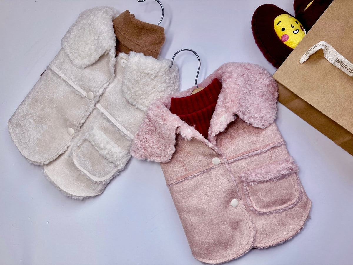 Luxury velvet dog vests in cream and pink with soft faux fur collars and pockets.