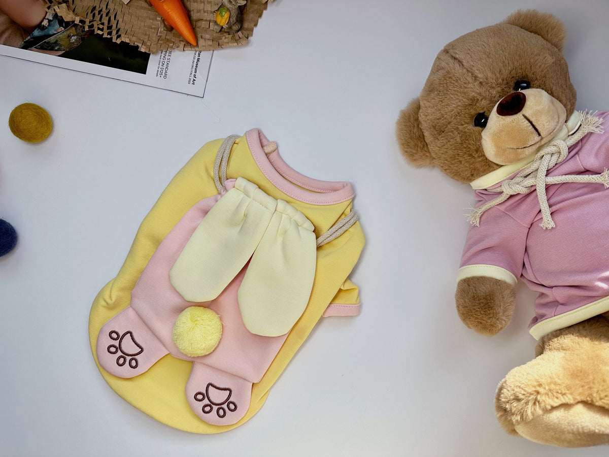 Yellow Bunny Bag Dog Shirt with pink bunny ears and paw print details